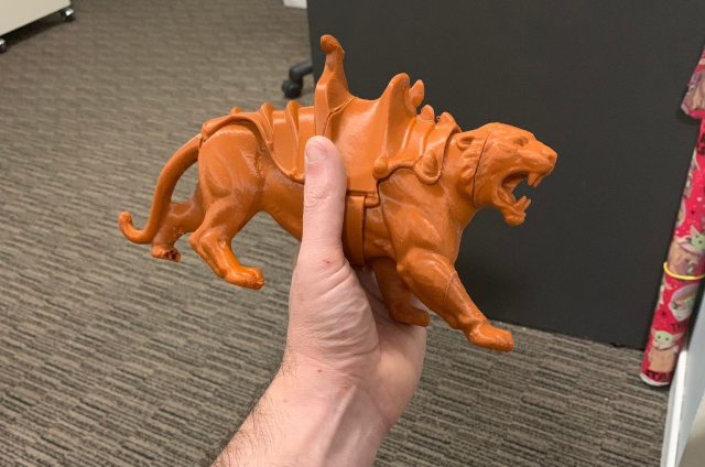 Orange 3D printed tiger with saddle
